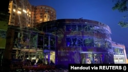 A shopping mall and apartment buildings were damaged by the Russian missile strike on Odesa on June 14.