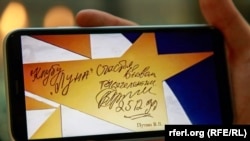 "Луна" клубунда Путиндин калтырган кол тамгасы.