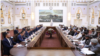 A Kazakh delegation meets with Afghan representatives in Kabul in April.
