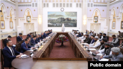 A Kazakh delegation meets with Afghan representatives in Kabul in April.