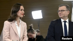 Санна Марин жана Петтери Орпо.