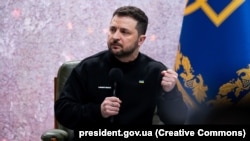 Ukrainian President Volodymyr Zelenskiy speaks to reporters in Kyiv on February 24. 