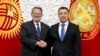 Kyrgyz President Sadyr Japarov (right) and U.S. Senator Gary Peters, the chair of the Homeland Security and Governmental Affairs Committee