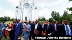 African heads of state and government, including South African President Cyril Ramaphosa (center), honor the civilians killed during the Russian occupation of part of the Kyiv region in Bucha on June 16.