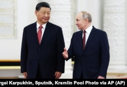 Голова Китаю Сі Цзіньпін і президент Росії Володимир Путін