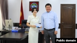 Исанбек кызы жана Талантбек Иманов.