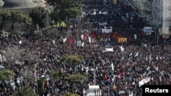 Афины шаарындагы демонстрациялардан тартылган сүрөт.