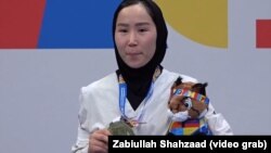 ذکیه خدادادی تکواندوکار افغان که در اروپا مدال طلا به دست آورد