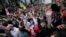 Demonstrators shout at police during an opposition protest against the "foreign agent" law in Tbilisi on May 28.