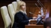 Anca Dragu, governor of the National Bank of Moldova, attends hearings in parliament in Chisinau on December 22.