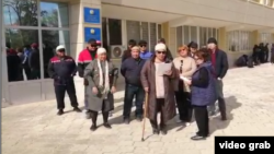 The mothers made their appeal outside the government building in Zhanaozen.