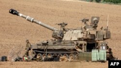 Ізраїльська самохідна гаубиця розташована біля кордону з Газою на півдні Ізраїлю, 10 жовтня 2023 року