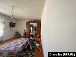 Gavhar Aibekova and her three children live in a 25-square-meter ramshackle house.