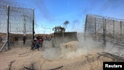 Прорив на ізраїльську сторону кордону Ізраїлю та Гази після того, як озброєні люди проникли в райони півдня Ізраїлю, 7 жовтня 2023 року