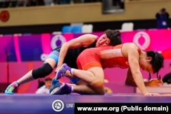 Айсулуу Тыныбекова менен Оркхон Пуревдрож Азия чемпионатынын финалдык беттешинде. Астана шаары. 12-апрель, 2023-жыл.