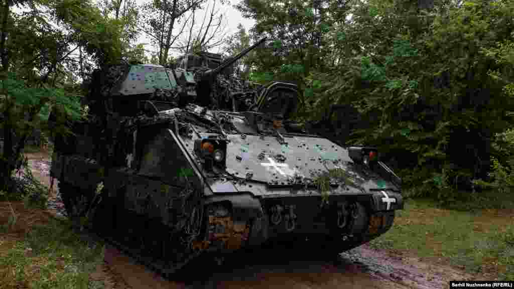 A U.S.-made M2 Bradley infantry fighting vehicle advances toward the front line in the southern Zaporizhzhya region on June 26. Kyiv has used Bradleys to try to penetrate Russian defenses in the region, with limited success.