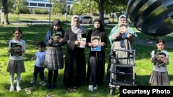 Члены семьи Низомиддина Насриддинова организовали пикет восзе офиса ООН в Бонне. 8 сентября 2023 г.