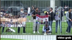 Участники акции протеста таджикской оппозиции в Берлине в сентябре 2023 года