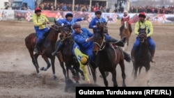 Бишкекте 2023-жылы Нооруз майрамына карата өткөрүлгөн көк бөрү. "Ынтымак" жана "Сары-Өзөн" командаларынын финалдык оюну.