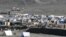 Pakistandan deportasiýa edilen owgan bosgunlary çadyrlarda ýaşaýar. Owganystan we Pakistan aradaky Torham serhet geçelgesi. Nangarhar welaýaty, Owganystan.