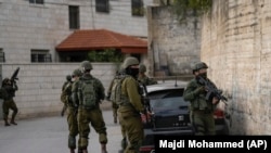 نیروهای اسرائیلی در بخشی از شهر غزه 