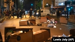 Франциядагы нааразылыктар маалында тартылган сүрөт.