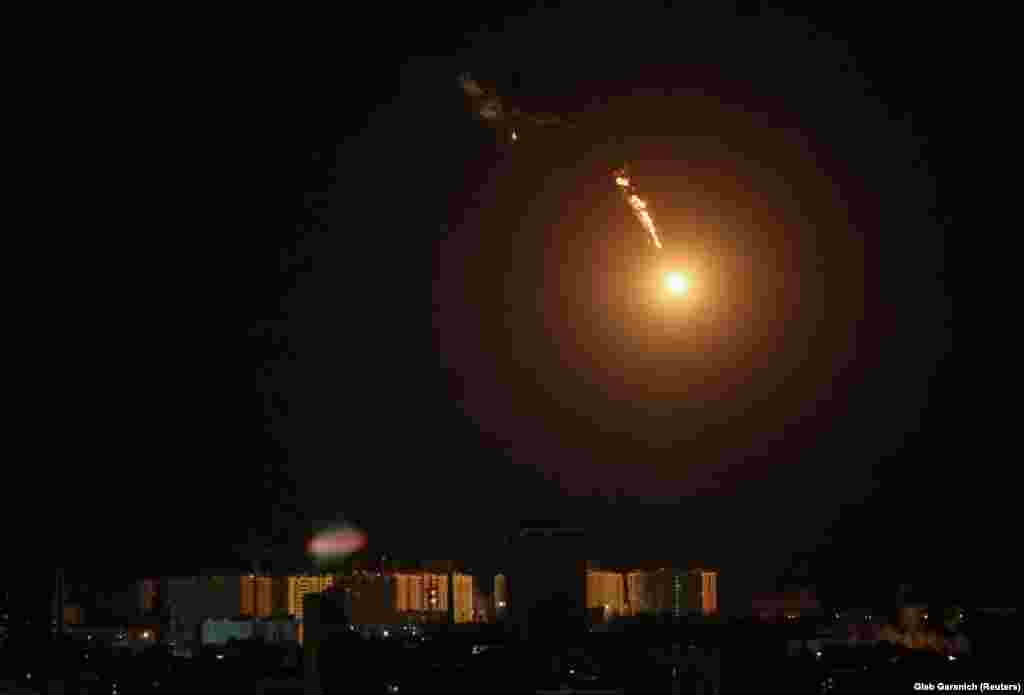The explosion of a drone is seen in the sky over Kyiv during a Russian drone strike on May 8.