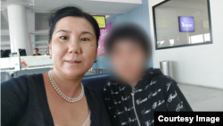 Бурул Усманали кызы менен Новосибирск шаарынын аэропортунда. 