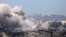 Клубы дыма после израильского удара по Газе