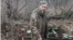  The video appears to show an unidentified, detained Ukrainian soldier standing in a trench being shot dead with automatic weapons after saying, "Glory to Ukraine."