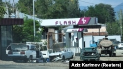 A view through a car window shows abandoned vehicles in Stepanakert following an Azeri military operation and a mass exodus of ethnic Armenians from Nagorno-Karabakh, October 2, 2023.