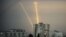 Russian rockets launches against Ukraine from Russia's Belgorod region are seen at dawn in Kharkiv on August 15.