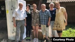 Волонтерка Тамара Яніна з родиною загиблого захисника