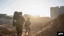 نیرو های اسرائیی در بخشی از نوار غزه . 