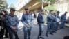 Armenia - Riot police stand outside a court in Yerevan during a hearing on businessman Samvel Karapetian's arrest, October 15, 2025.