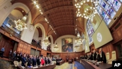 Netherlands - Judges enter as the delegations of Iran and the U.S. stand up at the International Court of Justice in The Hague, February 13, 2019.