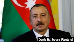 Илхом Алиев.