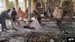 Ооганстандын Кундуз шаарындагы мечитте болгон, "Ислам мамлекети" террордук тобу жоопкерчилик алган чабуулдун кесепети, 8-октябрь 2021-жыл.