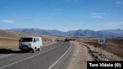 Armenia - A road to Nagorno-Karabakh passing through the village of Tegh.