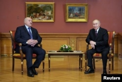 Александр Лукашенко и Владимир Путин на переговорах в Санкт-Петербурге 27 декабря 2022 года