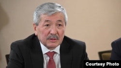 Адылбек Касымалиев.