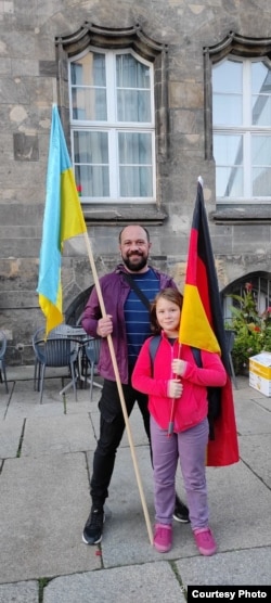 Костянтин з донькою в Німеччині