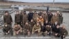 Ukrainian prisoners of war pose after a previous swap in the Zaporizhzhya region on November 24.