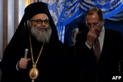 Православний патріарх Антіохійський Іоанн X і міністр закордонних справ Росії Сергій Лавров. Москва, 29 січня 2014 року