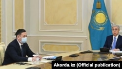 Касым-Жомарт Токаев жана анын администрациясынын жетекчиси Мурат Нуртлеу.