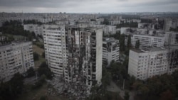 Up On The Roof, Ukrainians Survey Kharkiv Ruins