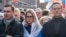 Russian opposition politicians Ivan Zhdanov (left to right), Lyubov Sobol, and Aleksei Navalny attend a rally in 2020 to mark the fifth anniversary of opposition politician Boris Nemtsov's assassination.