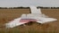 Остатки лайнера Malaysian Airlines, найденные у села Грабово Донецкой области. 17 июля 2014 года.