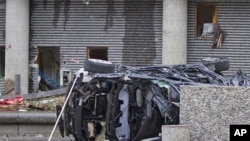 На месте взрыва в Осло обнаружена искореженная машина 