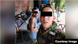 Украинада согушка катышкан деген негизде кармалган кыргыз жараны. УКМК тараткан сүрөт. 12-январь, 2023-жыл.